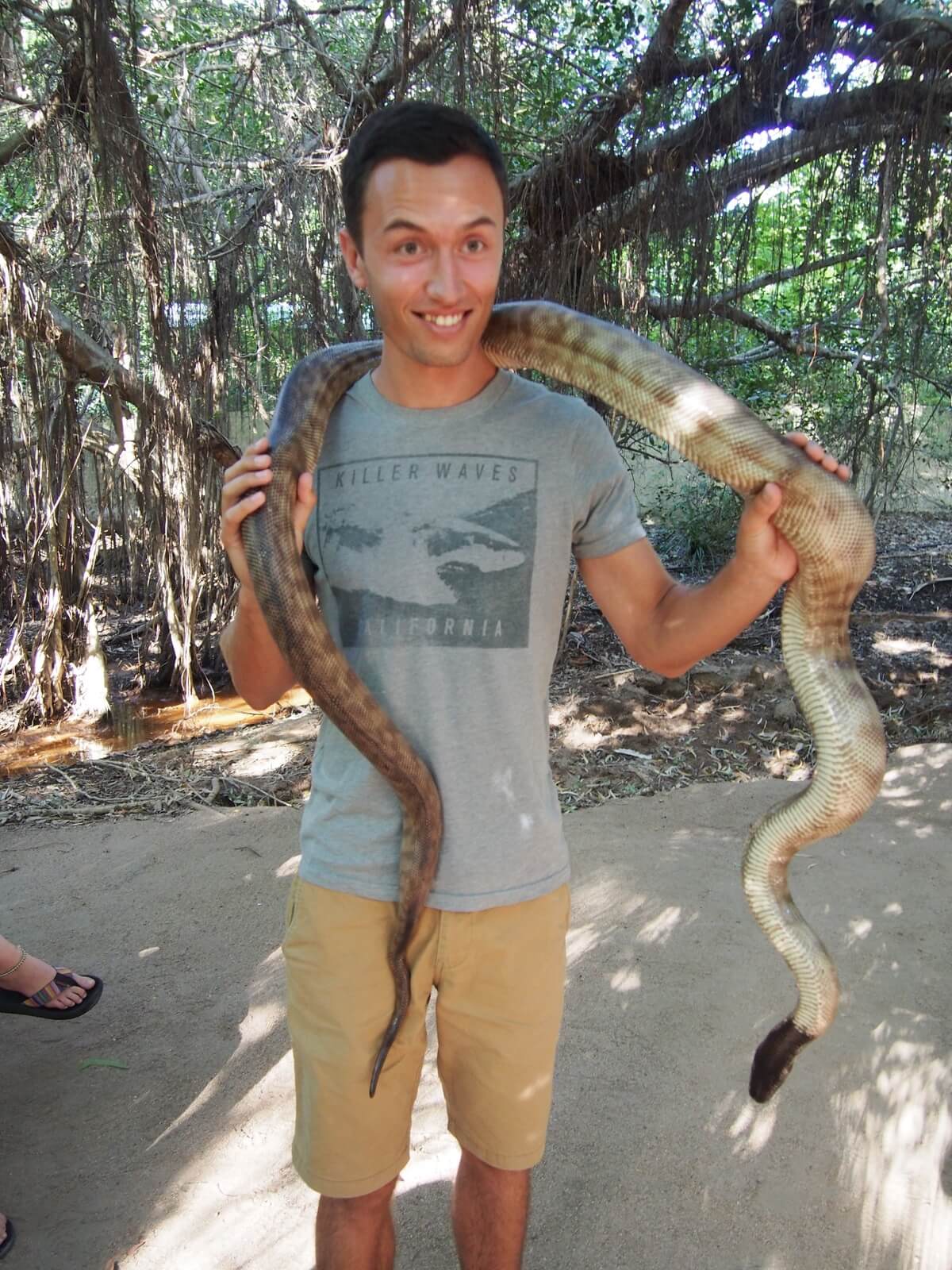 The face highlights the strange sensation of having a 6ft muscle wriggling around your neck. 